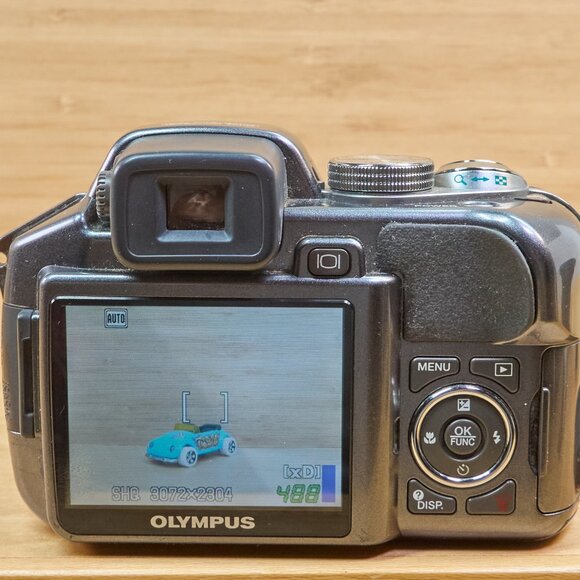 OLYMPUS SP-550UZ 7.1MP Digital Camera, 18x Optical Zoom, Image Stabilization - Picture 6 of 9